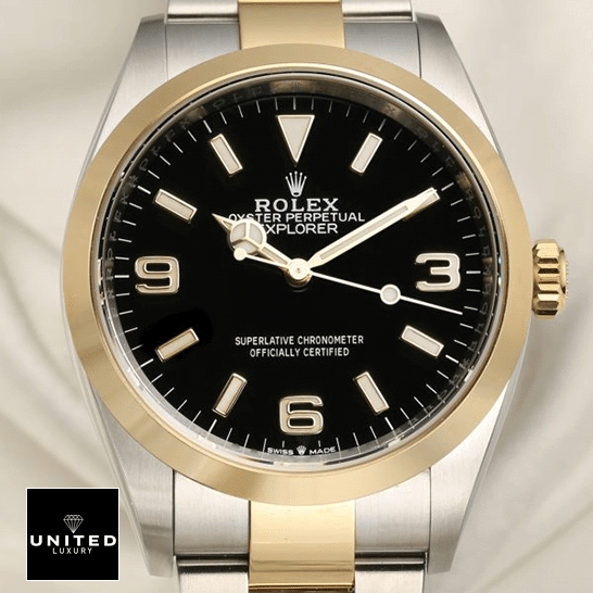 Rolex Explorer 124273 "Black Dial" Ultra Realistic Replica Rolex 2021 Explorer 124273 Yellow Gold Bezel Replica cream tulle background